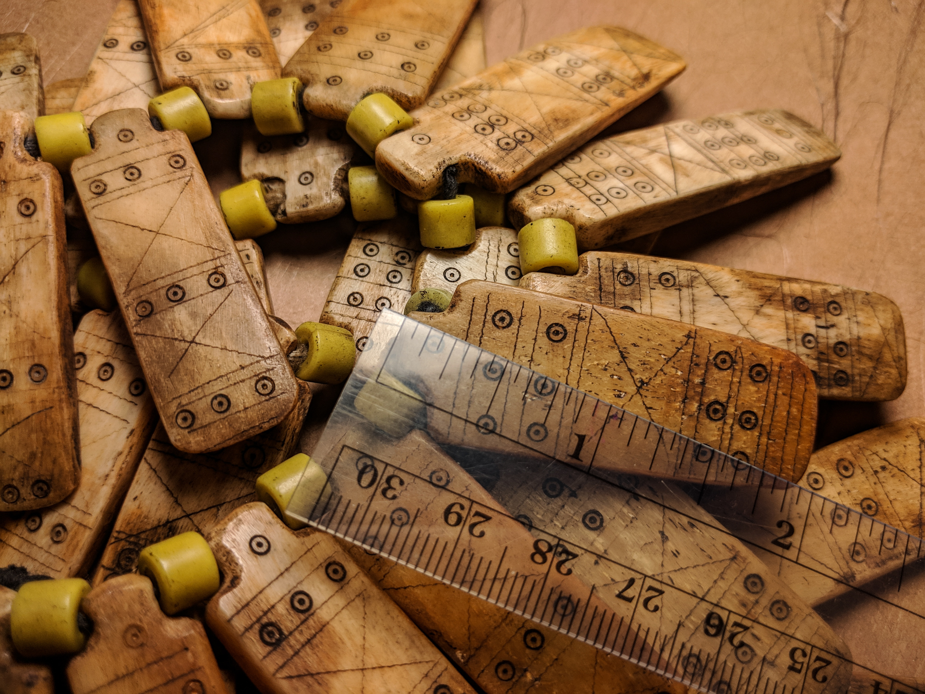 Close-up of tabular bone beads